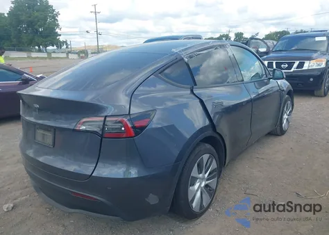 2023 Tesla Model Y Rwd z USA, uszkodzony, nr VIN 7SAYGDED6PF945373